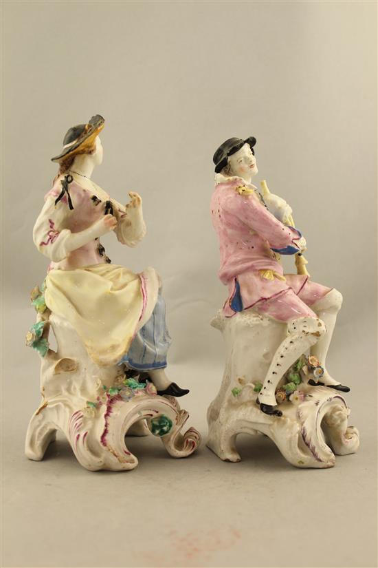 A pair of Chelsea-Derby figures of musicians, c.1775, 21.5cm, restorations